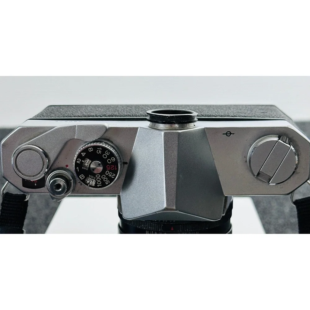 Konica Autoreflex T 35mm SLR Film Camera with Soligor Lens Silver Black UNTESTED